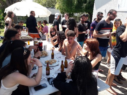 Surf team building social dinner outdoors — long tables, Gaia and north Portugal surf group